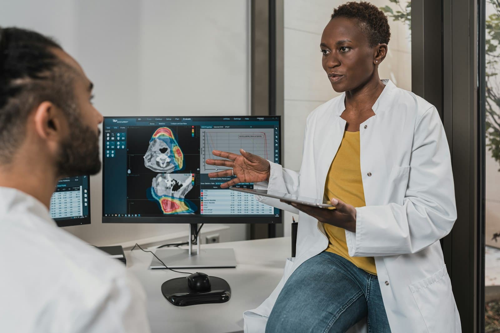 Doctor discussing scan results with a patient