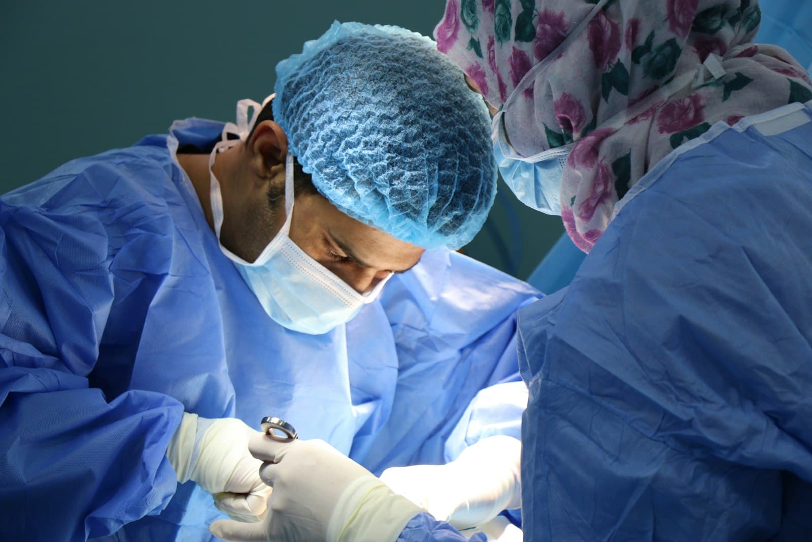 Surgeons performing an operation